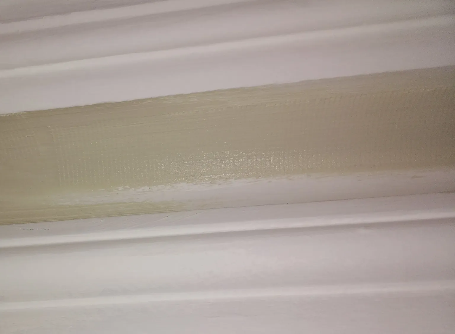 Applying filler over scrim tape