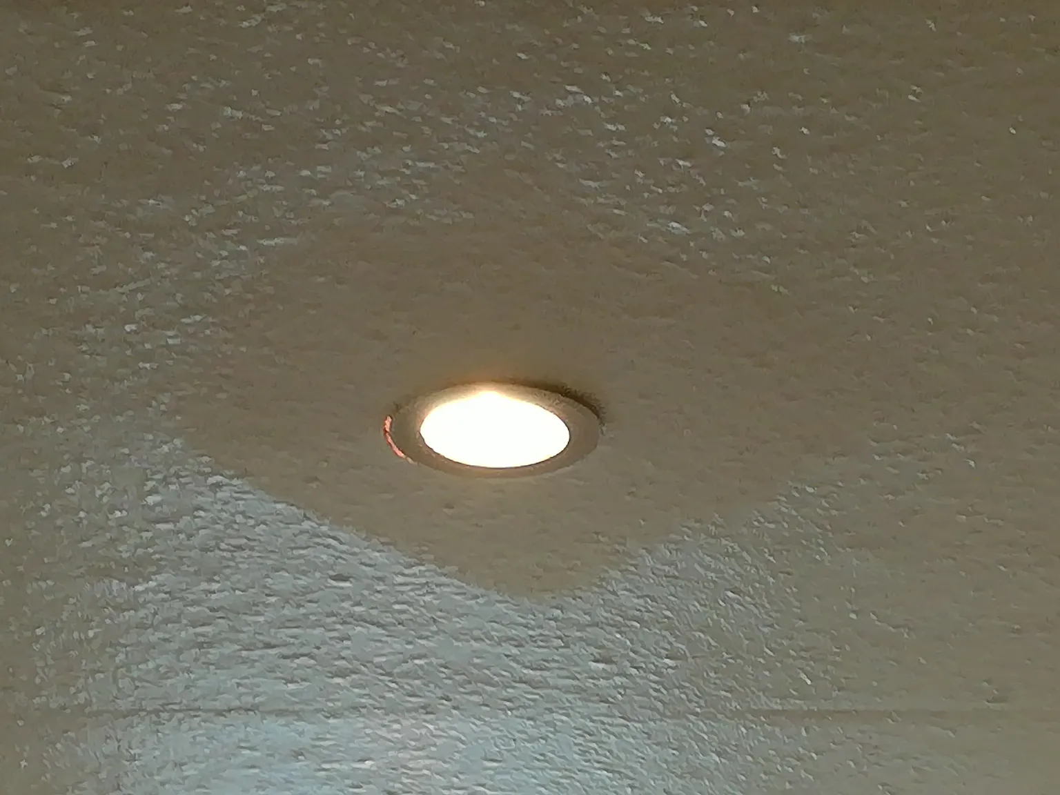 Flat matt paint around light fitting